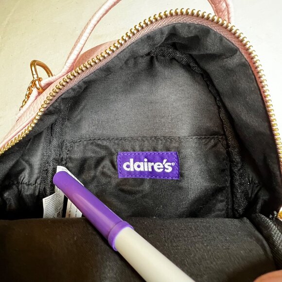 Pink Quilted Mini Backpack With Tassel Accents & Adjustable Strap By Claires - Picture 2 of 16